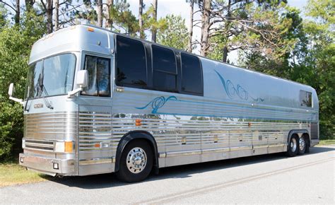 Lifted Chevy Trucks. . Prevost tour bus